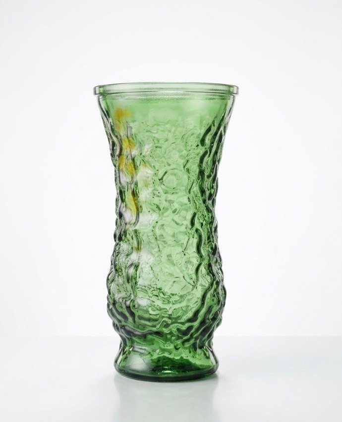 Full frontal view of an 8.5-inch emerald green Hoosier Glass vase showing bark/crinkle texture, flared rim, and footed base.