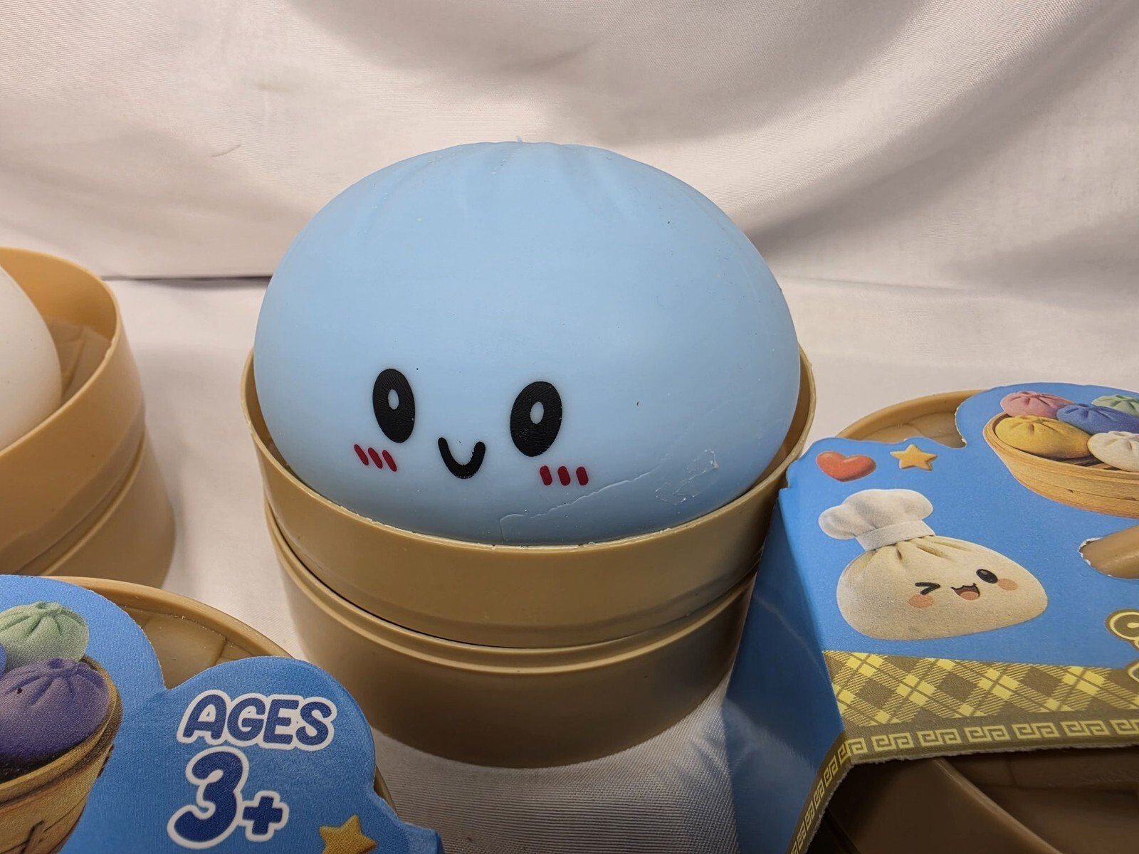 Squeezy Dumpling Squishy Sensory Fidget Toy with Bamboo Steamer Basket - Image 2
